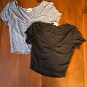 Two short sleeve tops. Small. Blue and dark grey